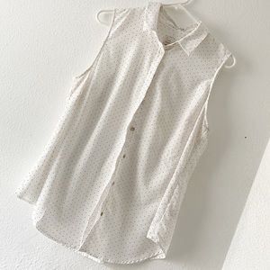 White and black polka dot sleeveless shirt